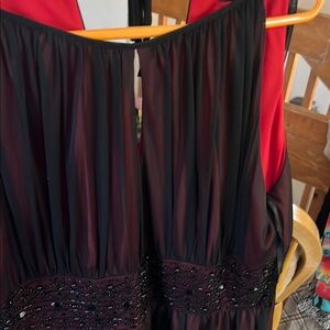 Black and red lined sleeveless evening dress
Jessica Howard